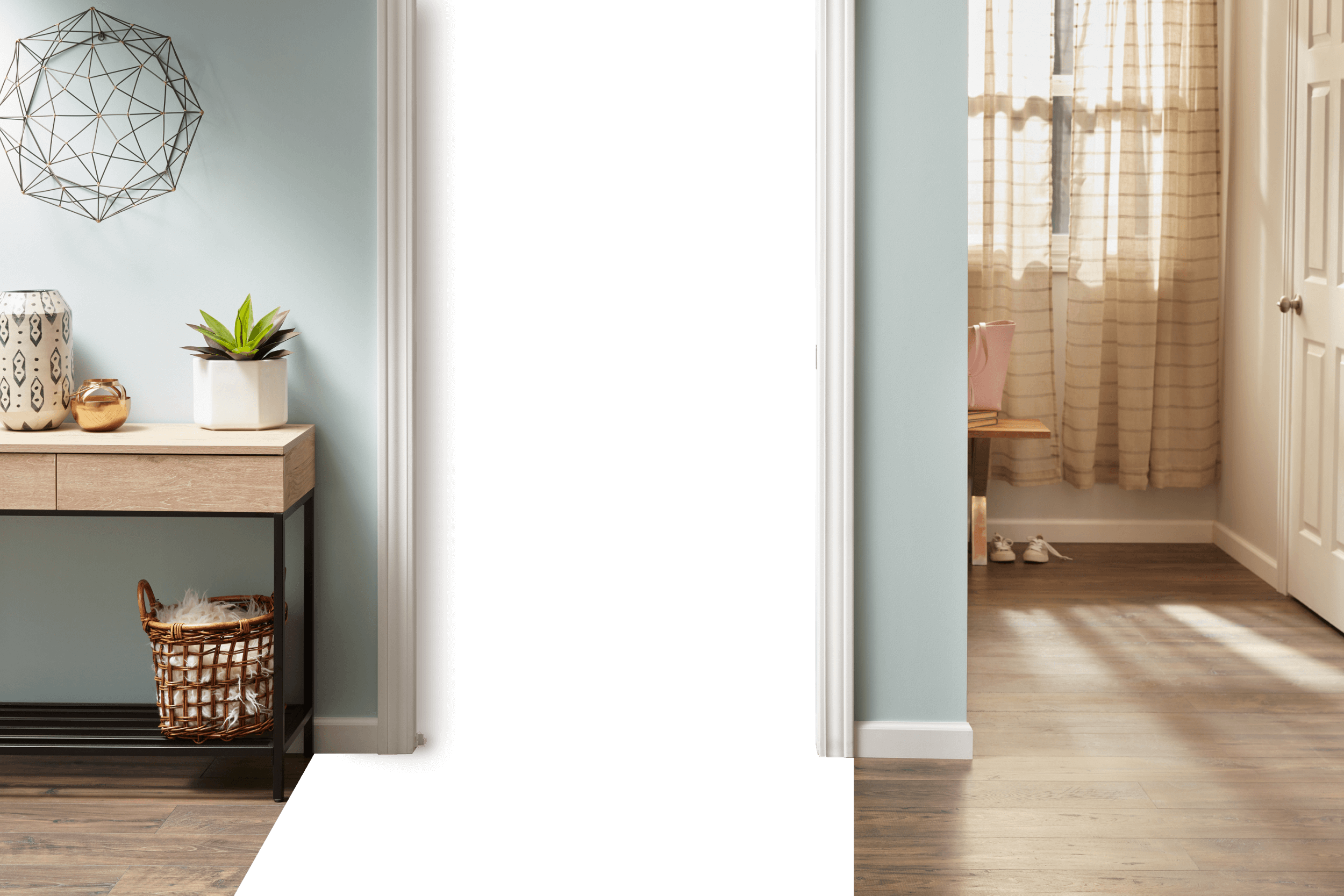 A laundry closet in a clean home with wood floors.