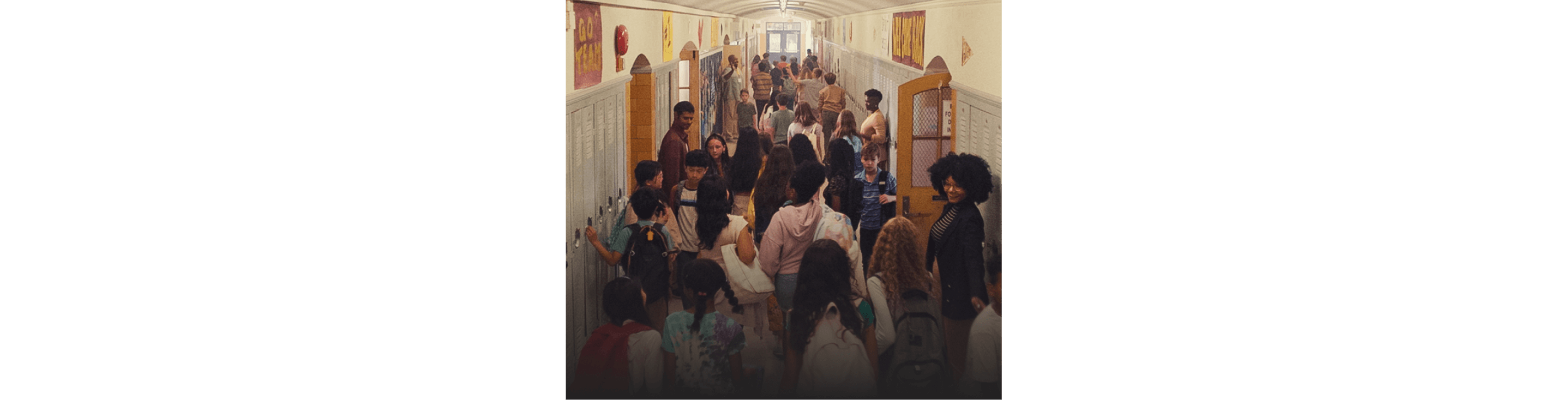 Kids and teachers filling up a school hallway