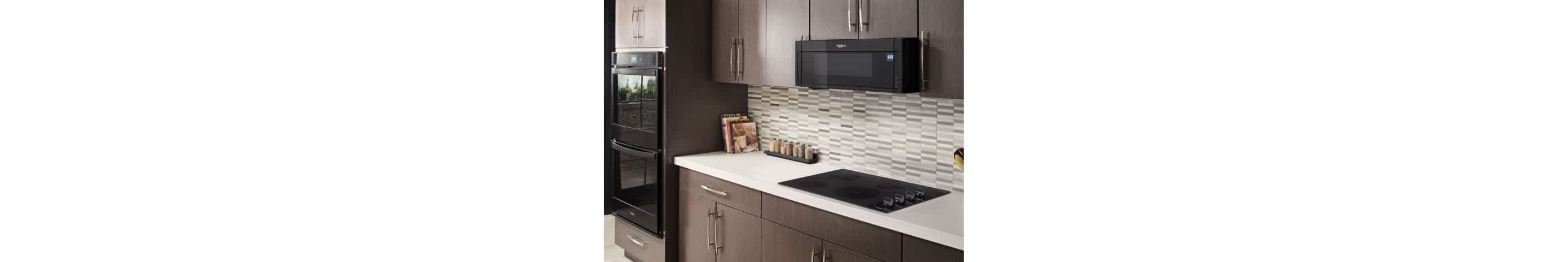 An electric cooktop built into a kitchen cabinet