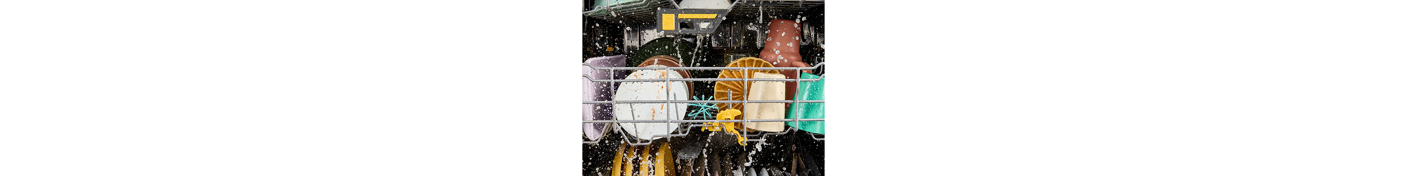 Dishes rinsed clean with Total Coverage Wash Action
