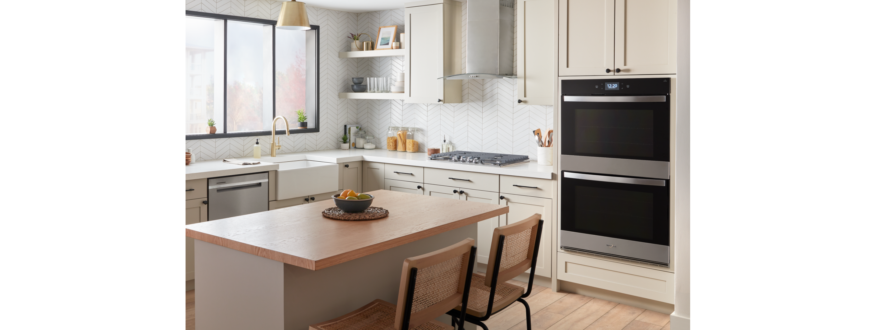 A bright modern kitchen full of Whirlpool® Kitchen Appliances
