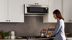 Low profile over outlet the stove microwave