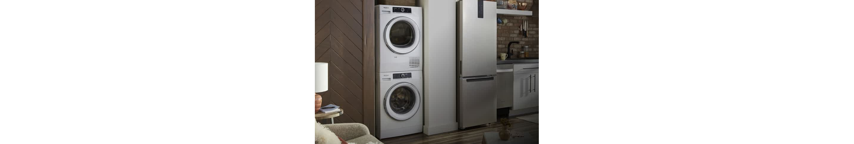 A stacked Whirlpool® Washer and Dryer in a closet