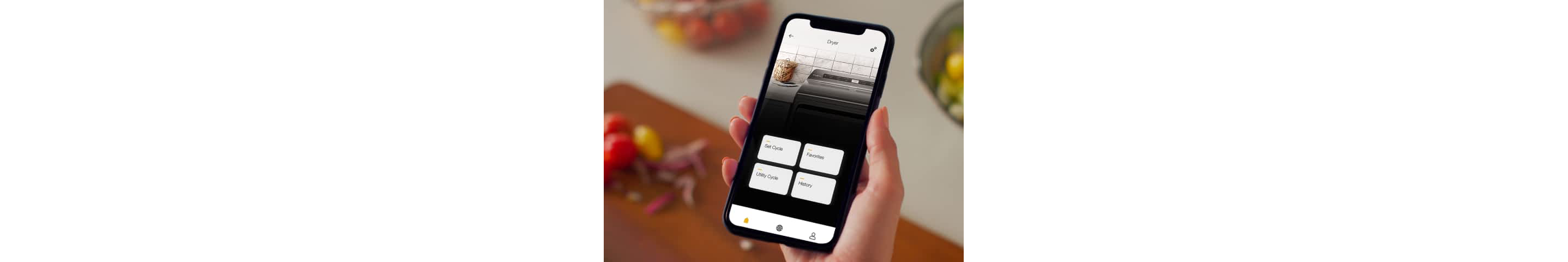 A phone displaying the Whirlpool® App