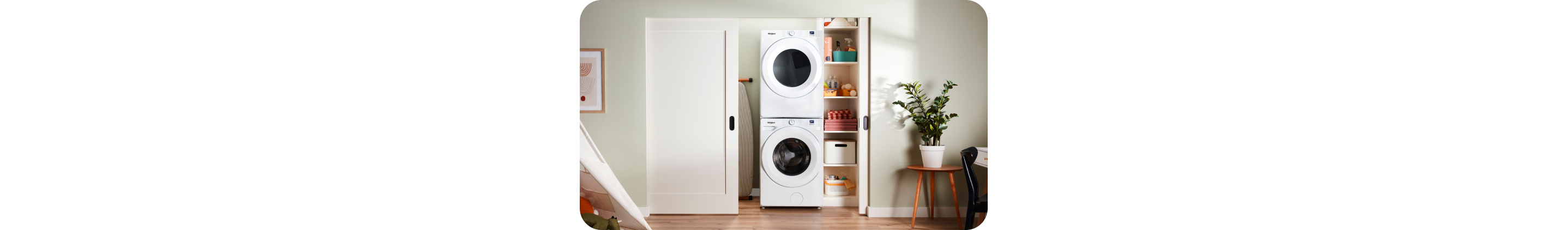A Whirlpool® Stacked Laundry Center in a closet