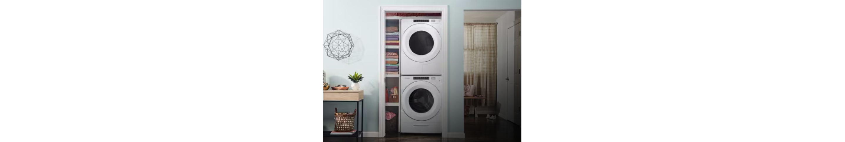 A stacked Whirlpool® washer and dryer in a closet