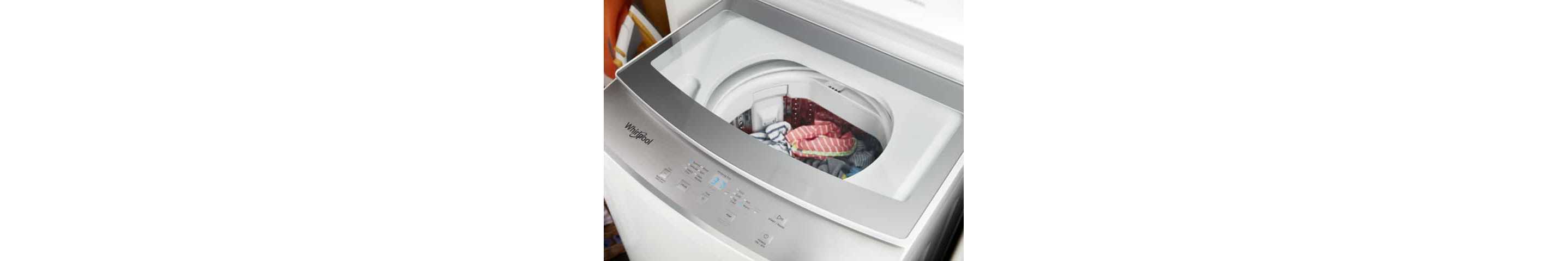 The EasyView™ Glass Lid with Slow-Close Technology on a Whirlpool® Stacked Laundry Center