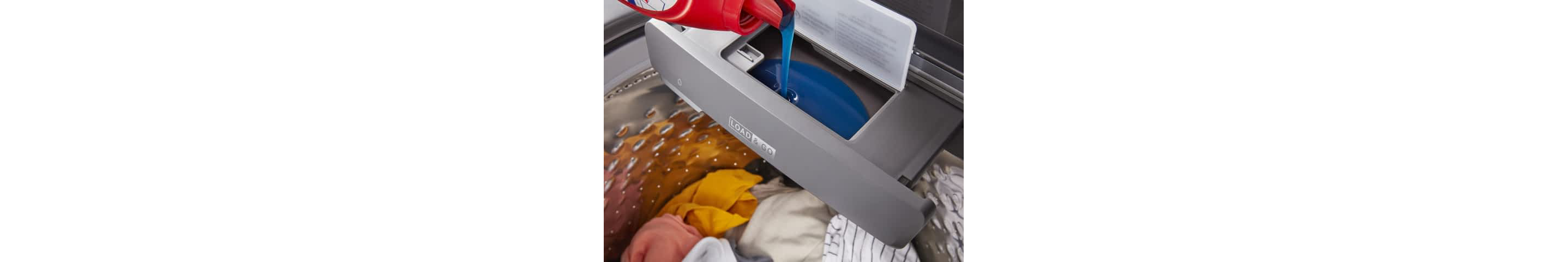 Laundry detergent being poured into a Load & Go™ Dispenser