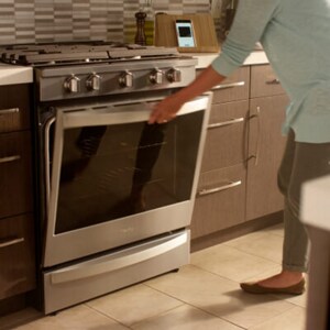 Someone opening their oven door