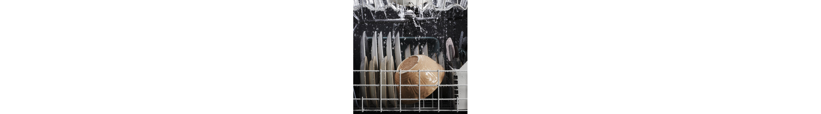 Dishes being cleaned in a dishwasher