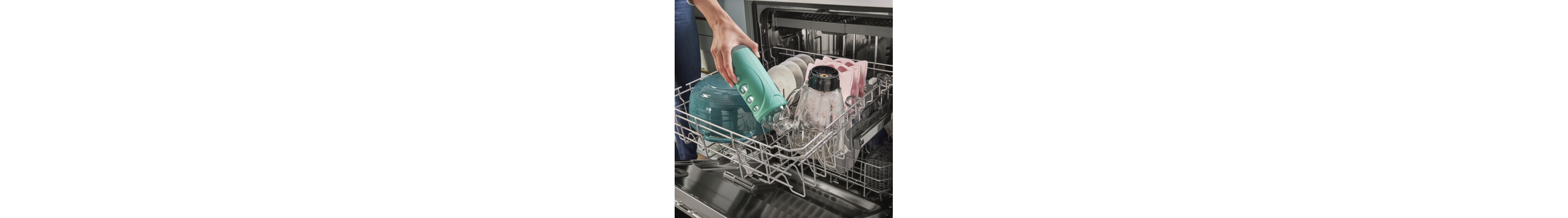Person loading a dishwasher