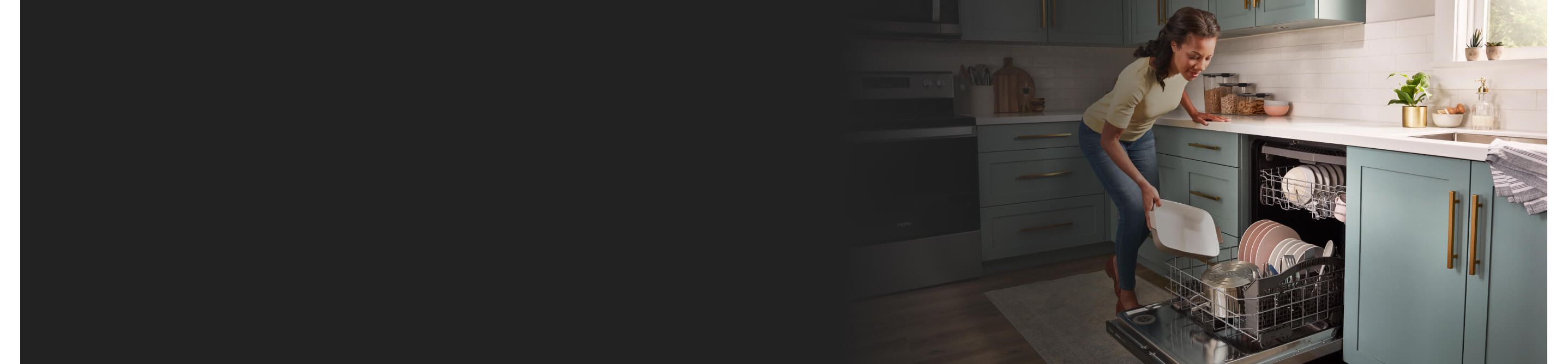 Person loading a dishwasher