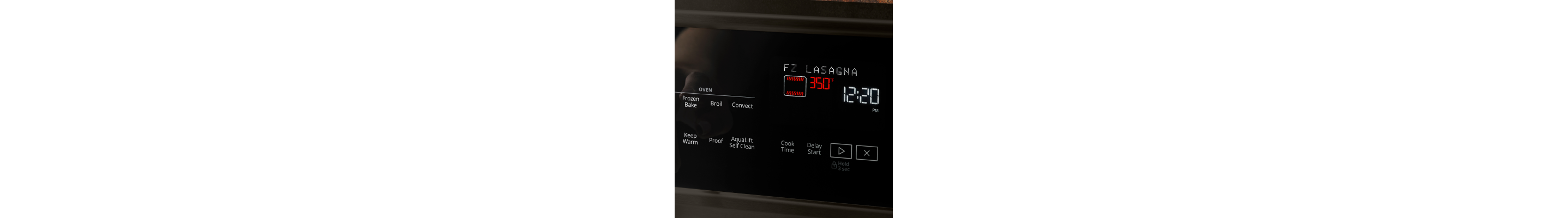 An oven control panel set to 350°F .