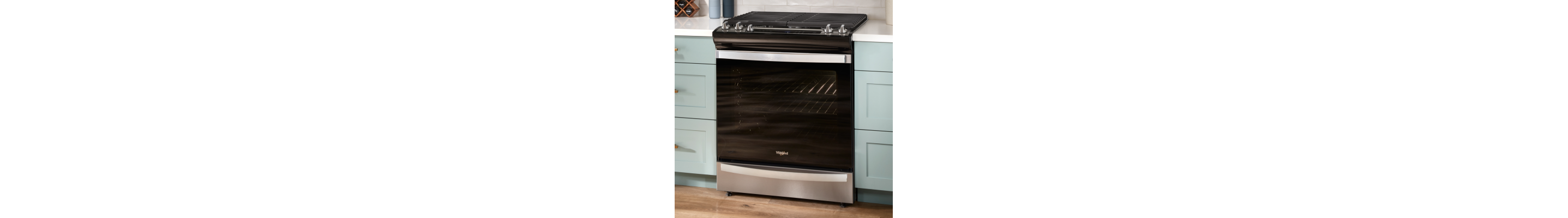 A Whirlpool® slide-in range with a warming drawer.