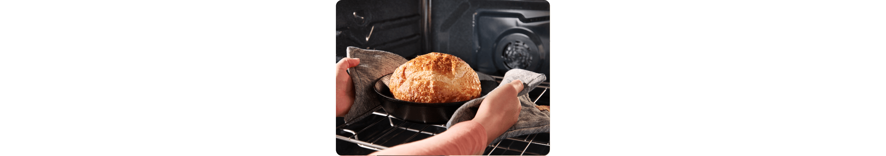 Loaf of bread cooking inside the oven.