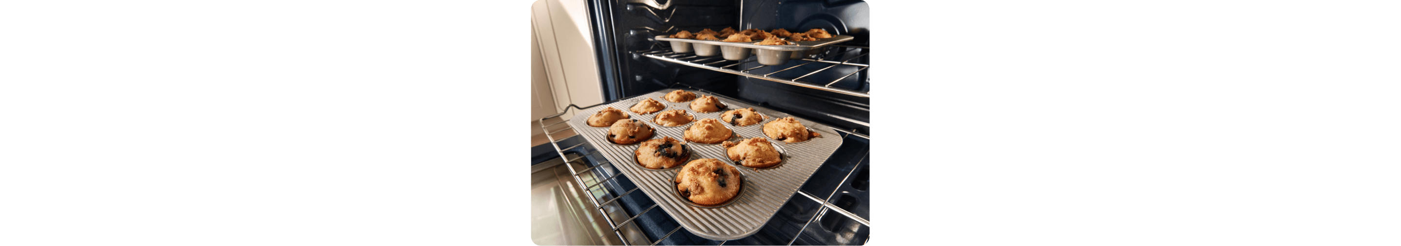 Muffins baking inside an oven