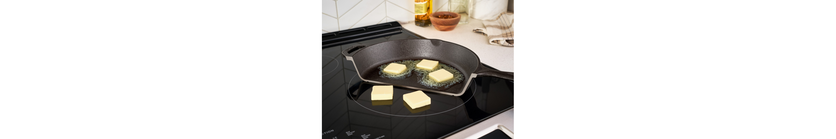 Cubes of butter melting on a cooktop