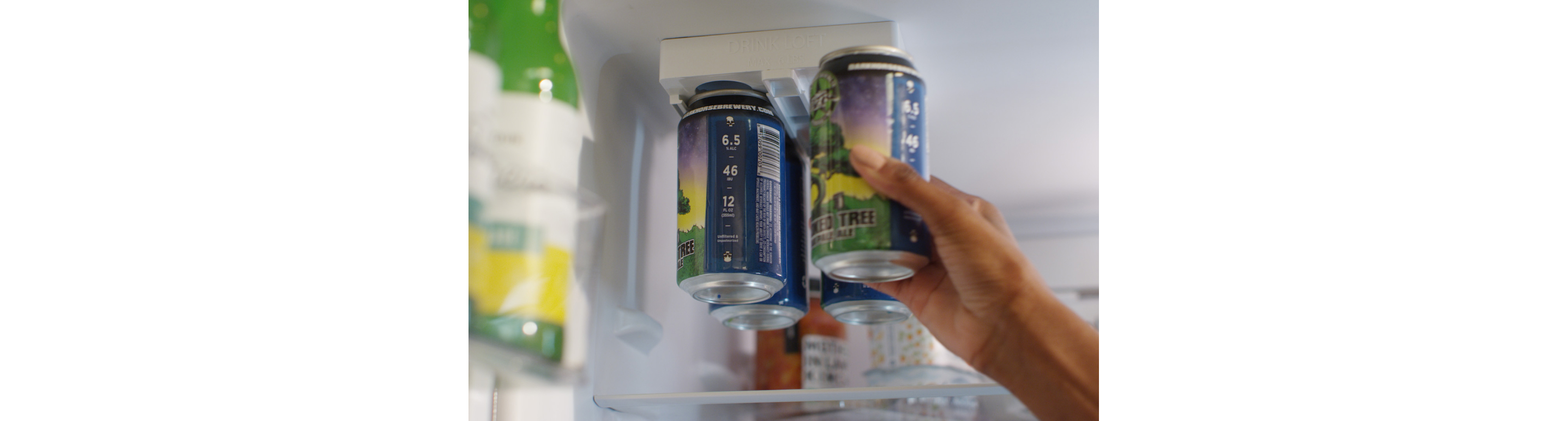A Whirlpool® small space refrigerator with Drink Loft™ storage.