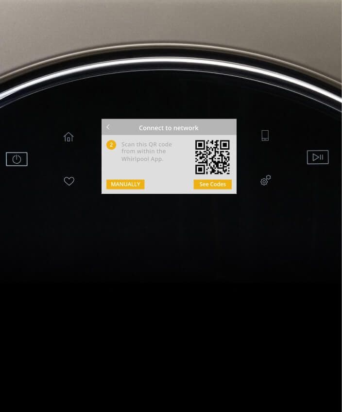 Using a smartphone to check on a meal cooking in the smart oven