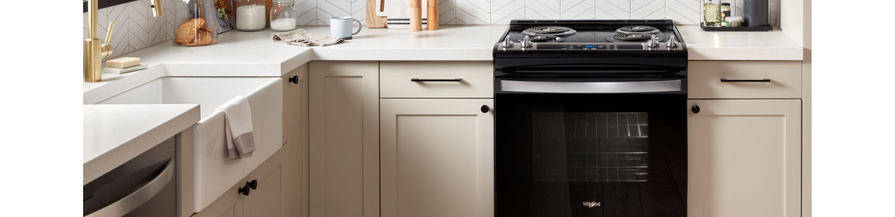 A bright, clean kitchen with a Whirlpool® Starter Electric Range