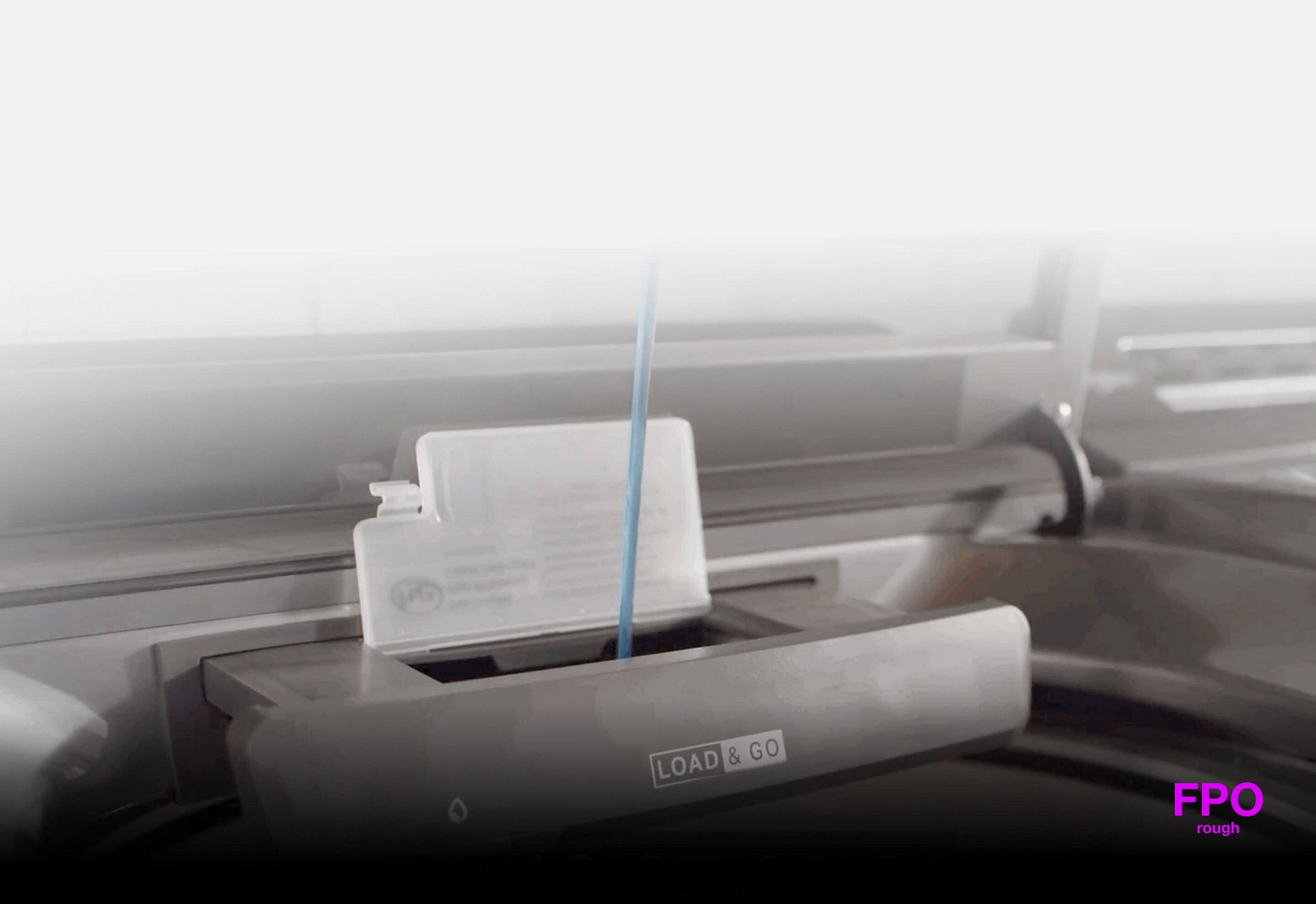 Filling the Load & Go™ Dispenser with detergent
