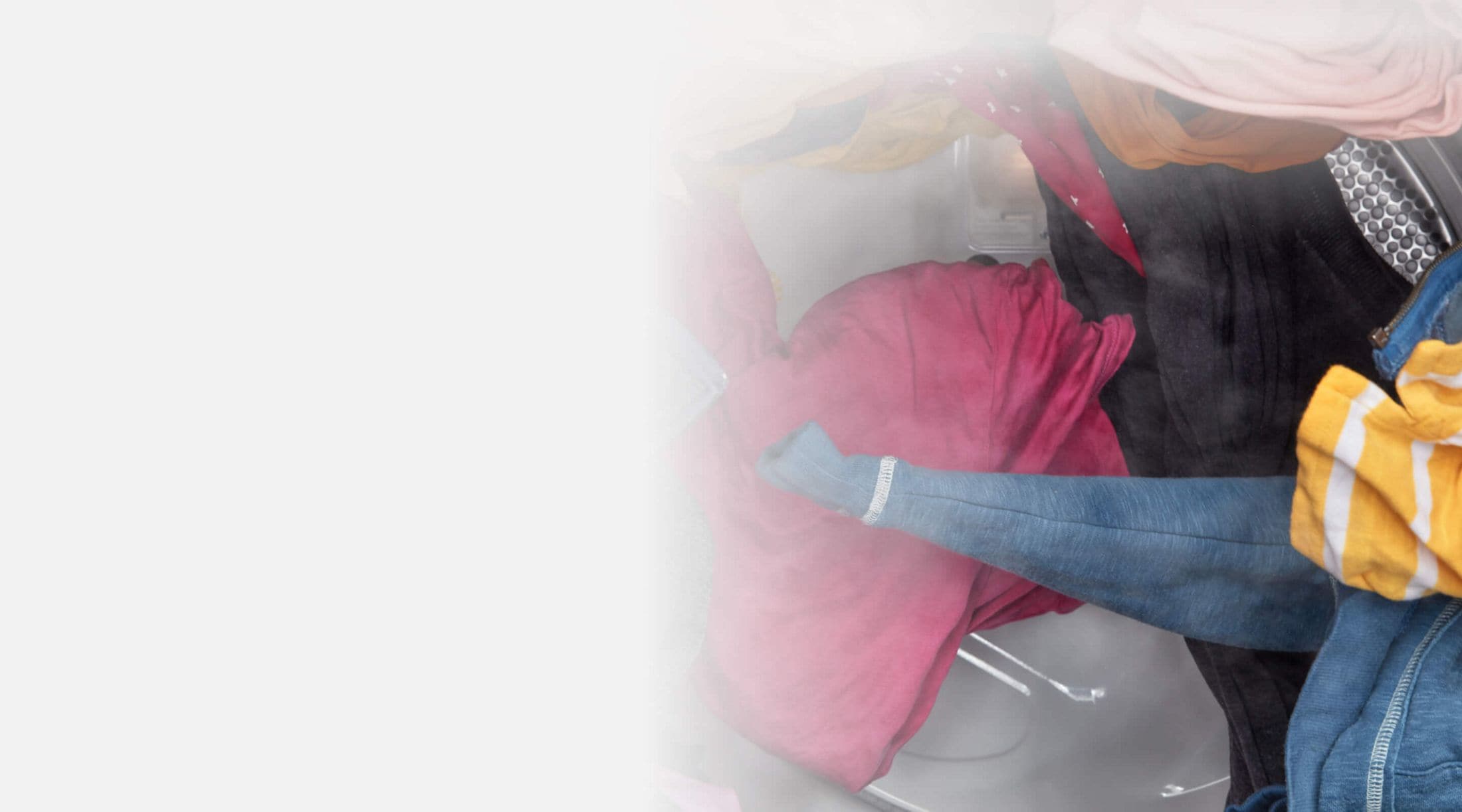 Tumbling clothes with steam