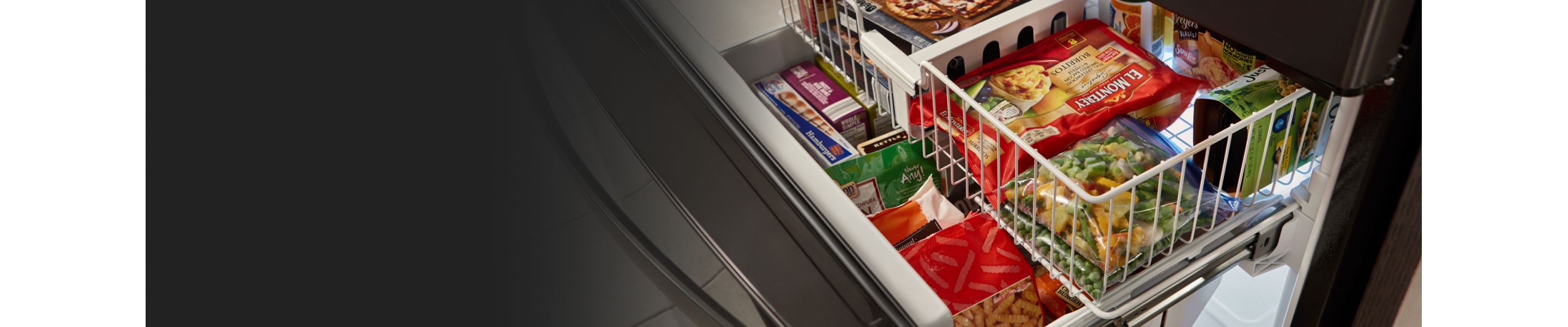 A multi-shelved freezer with food in it.