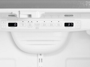 A refrigerator temperature control panel