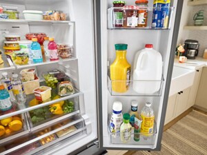 An open refrigerator, full of food