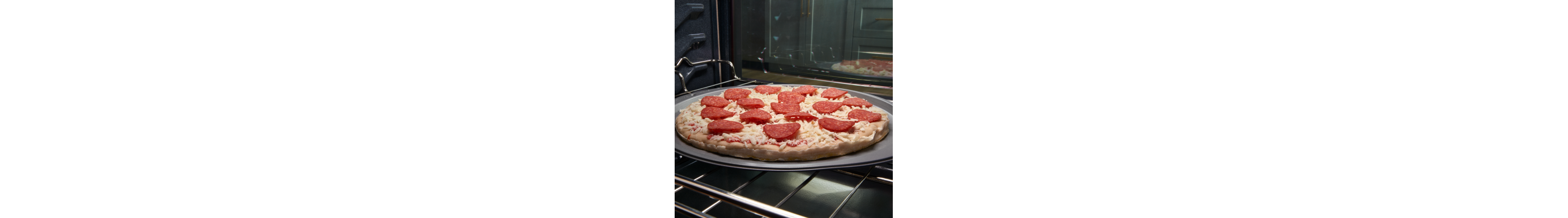 A frozen pizza in an oven