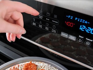 A person selecting Frozen Bake on a control panel