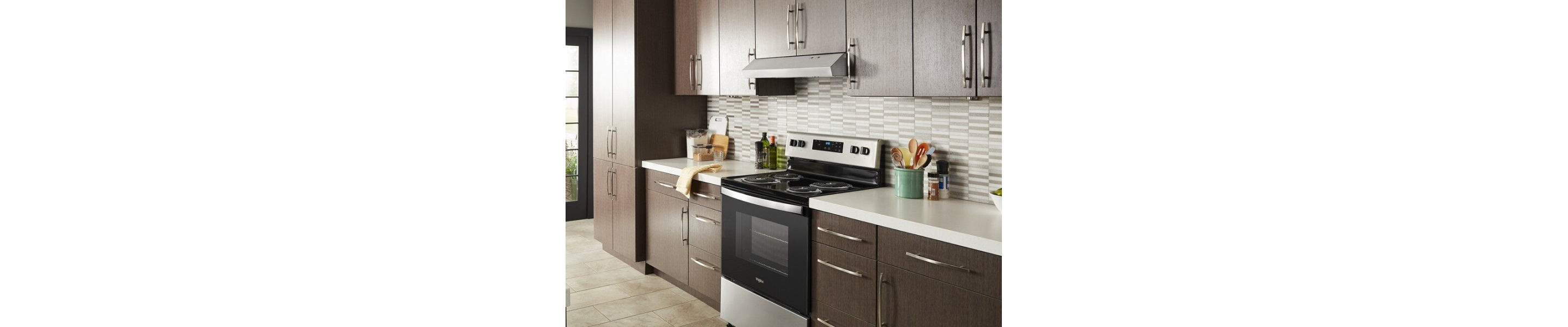 Under-cabinet range hood over a range
