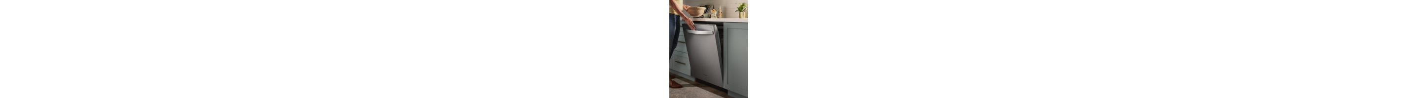 Person closing a top control dishwasher
