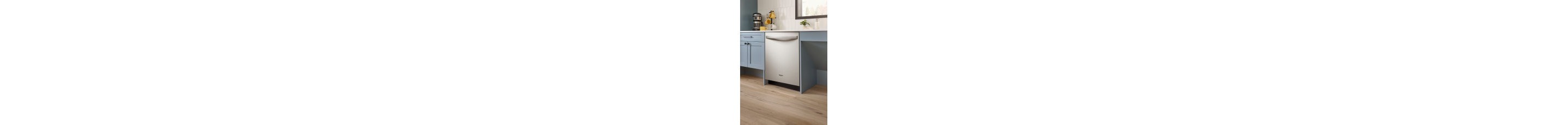 Top control dishwasher built into blue cabinets