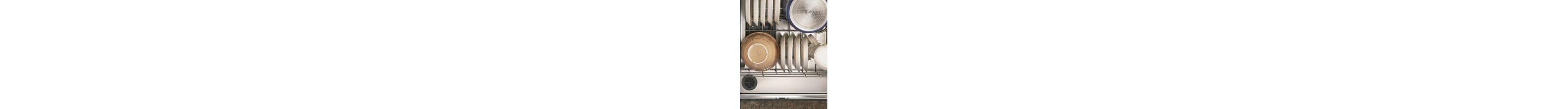 Dishes loaded inside a dishwasher