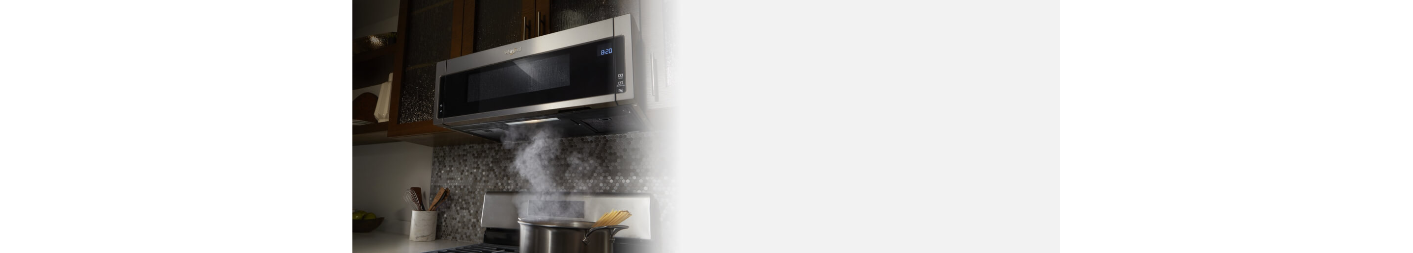 Low prifile microwave above a kitchen range