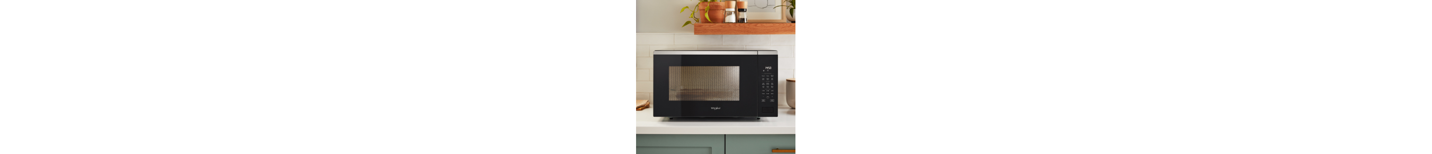 Whirlpool® Countertop Microwave on a white counter