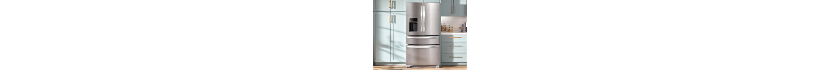 A Whirlpool® Refrigerator surrounded by light blue cabinetry