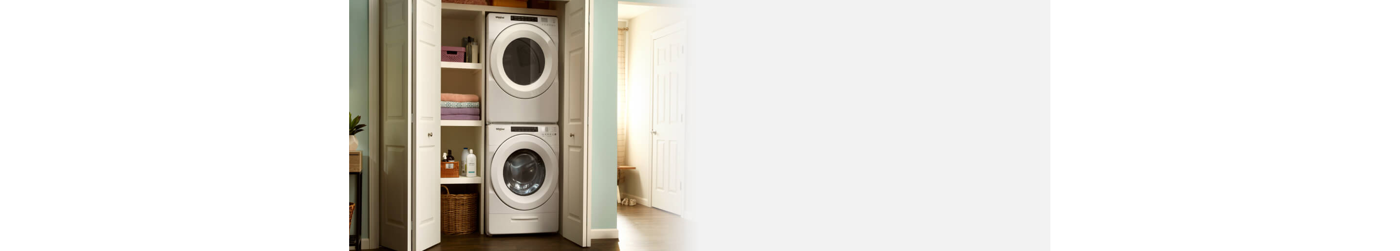 Whirlpool® Stackable Washer and Dryer inside a closet