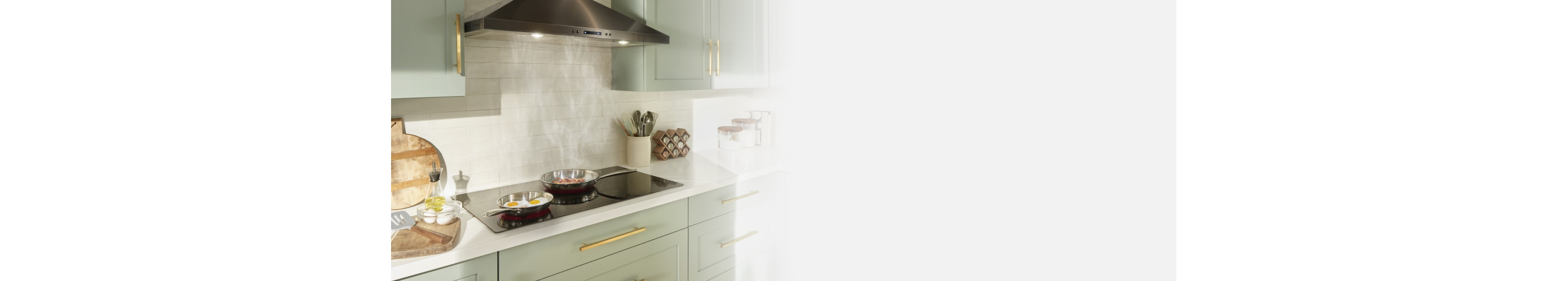 Electric cooktop under a canopy kitchen hood