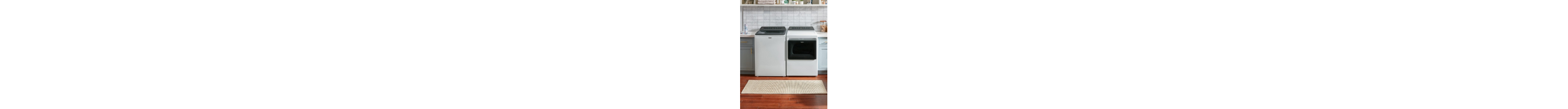 Whirlpool® Front Load Washing Machine in a laundry room