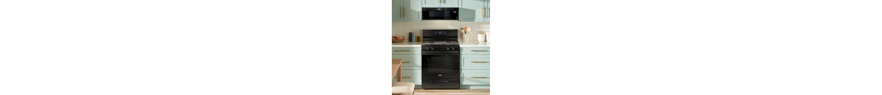A Whirlpool® Microwave above a Whirlpool® Range