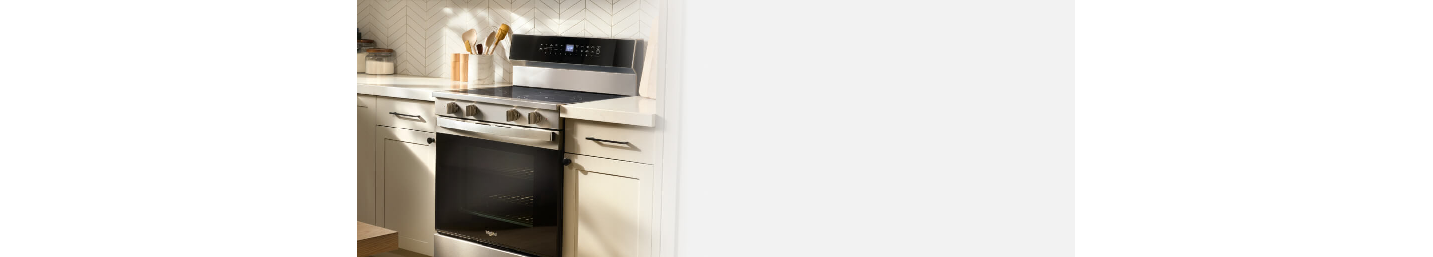 Whirlpool® Electric Range in a white kitchen