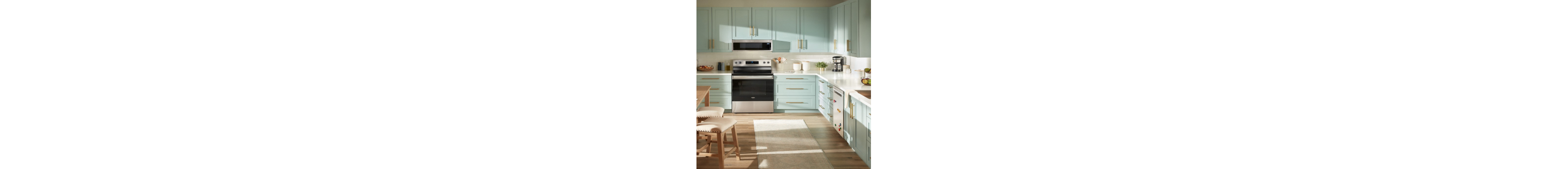 A stainless steel Whirlpool® Microwave and Whirlpool® Range in a kitchen
