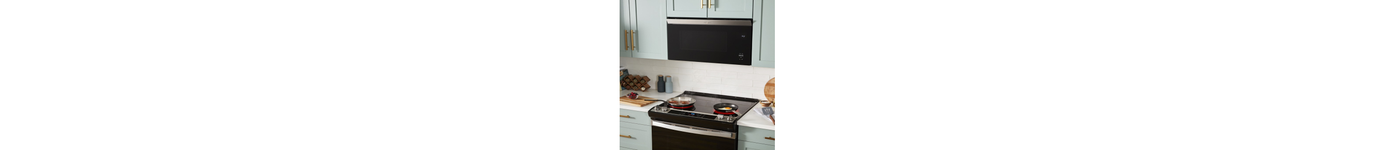 An over-the-range Whirlpool® Microwave above a Whirlpool® Range