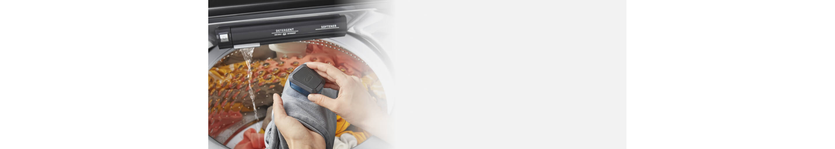 Person using the Whirlpool® Washer with Pretreat Station