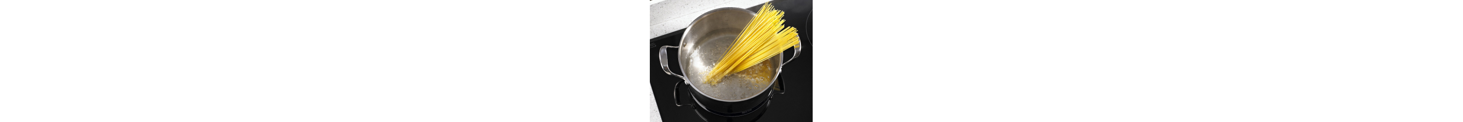 Noodles in a stainless steel pot