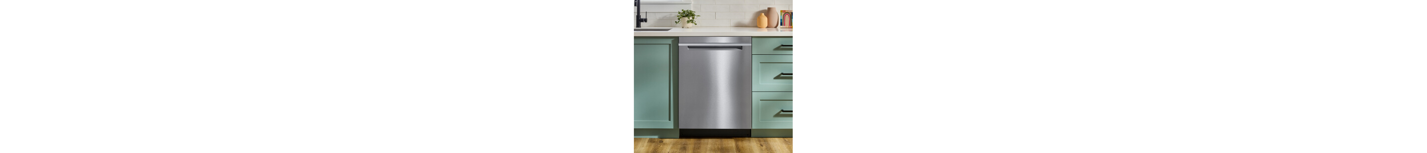 A Whirlpool® Dishwasher and teal cabinetry