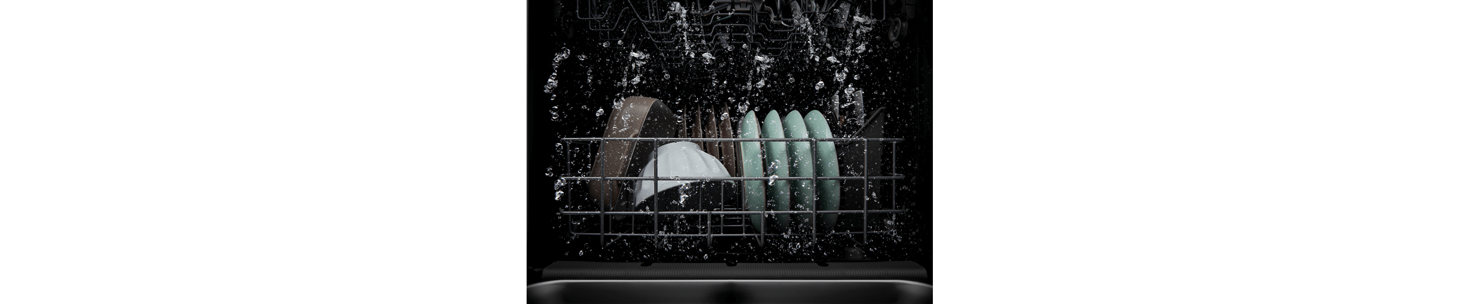 Dishes being cleaned in a dishwasher wash cycle