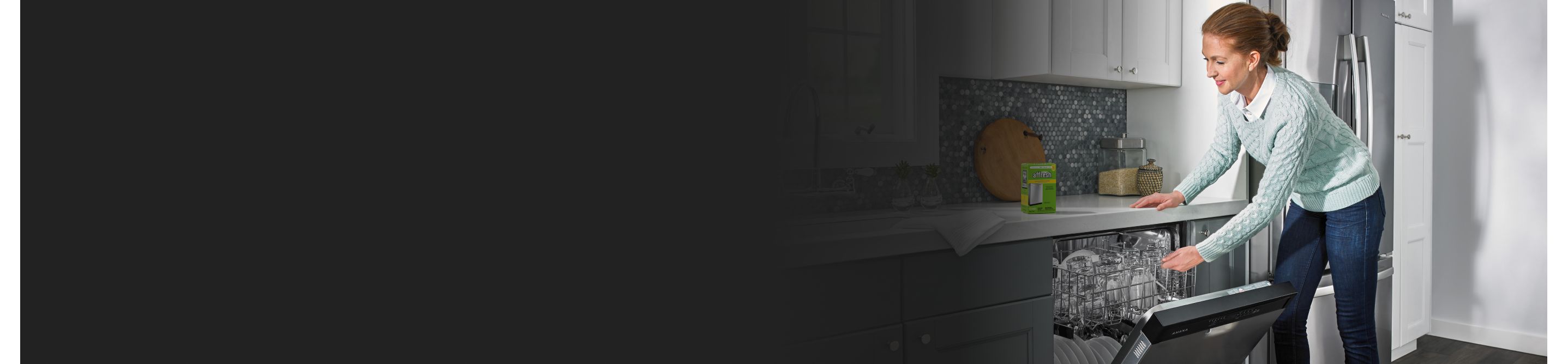 Person loading dishwasher